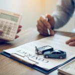 Finance manager of the car showroom is calculating the cost of reserving a new car